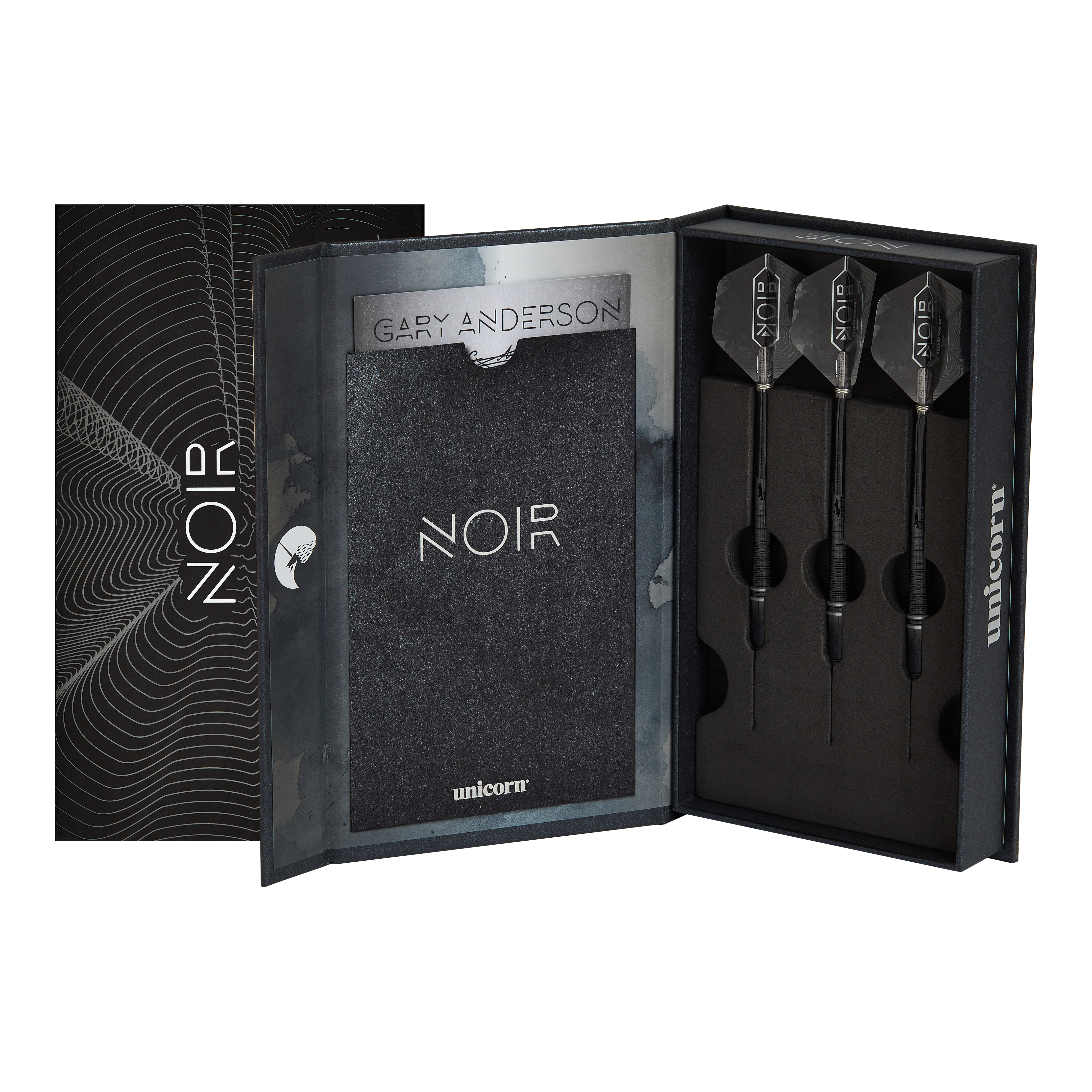 Mistrz Świata Jednorożców Gary Anderson Noir Phase 6 Soft Darts Das Bild zeigt eine elegante schwarze Verpackung mit der Aufschrift "NOIR", in der drei Softdarts ordentlich eingelegt sind. Es handelt sich um das Produkt "Unicorn World Champion Gary Anderson Noir Phase 6 Softdarts".