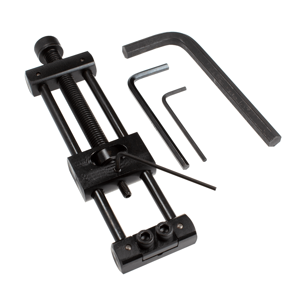 Designa Dart Repointer Black Pro Edition - Zmieniacz końcówek Dieses Bild zeigt den Designa Dart Repointer Black Pro Edition - Spitzenwechsler. Es handelt sich um ein Werkzeug zum Austausch von Dartspitzen in schwarzem Design.