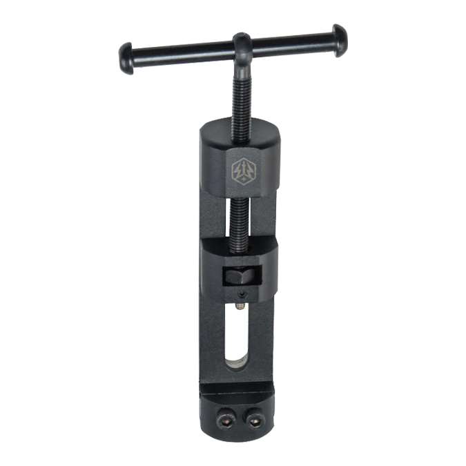 Caliburn Professional Darts Repointing Tool - zmieniacz końcówek Das Bild präsentiert das Caliburn Professional Darts Repointing Tool - Spitzenwechsler. Dieses Produkt erleichtert den Austausch von Dartspitzen.
