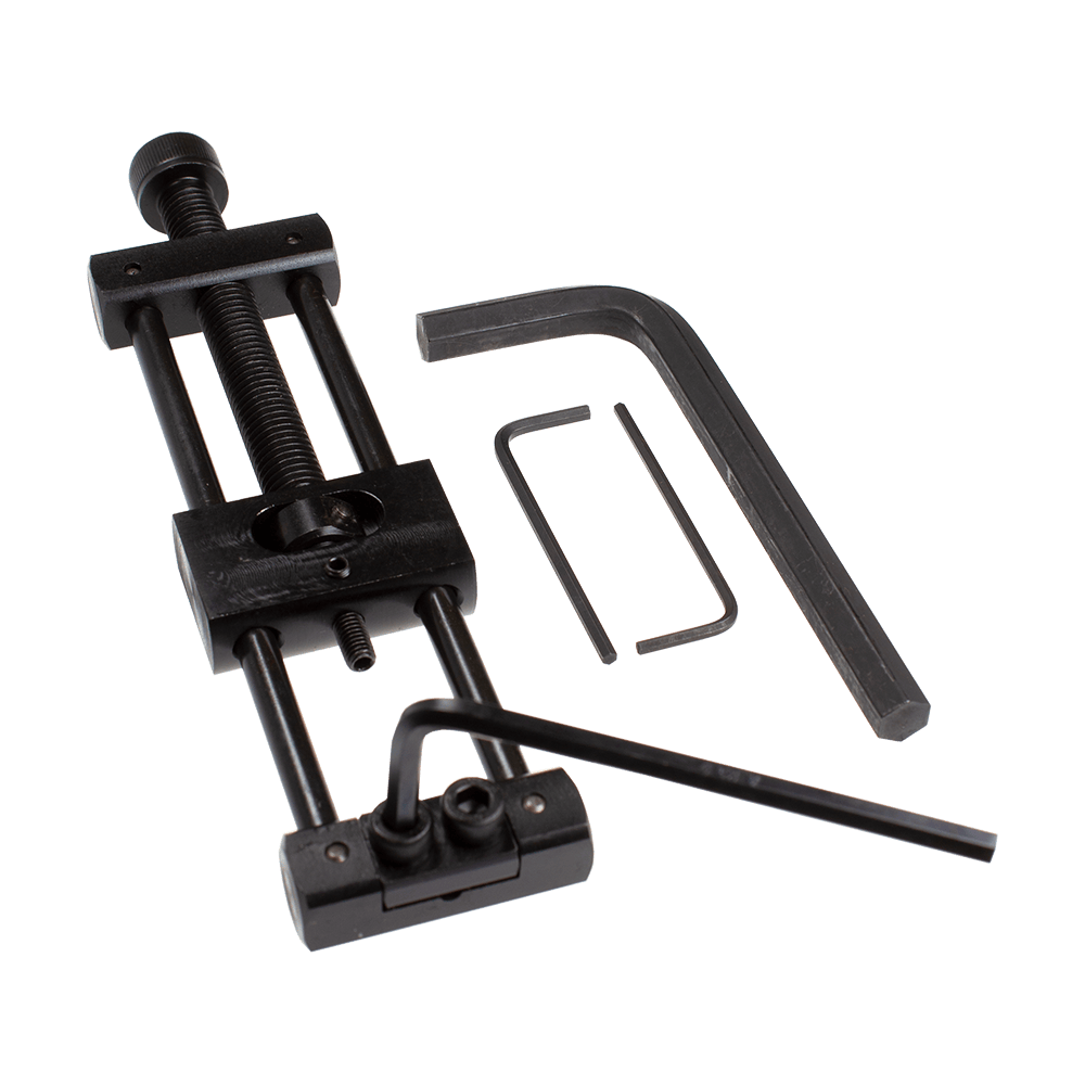 Designa Dart Repointer Black Pro Edition - Zmieniacz końcówek Das Bild zeigt den Designa Dart Repointer Black Pro Edition - Spitzenwechsler. Es handelt sich um ein Werkzeug für Dartspieler zum Wechseln der Spitzen.