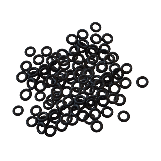 601Y_Shaftgummis_1000er_Set_1 Auf dem Bild sind viele kleine schwarze Gummiringe zu sehen. Es handelt sich um das Produkt "Shaftgummis (1000er Set)".